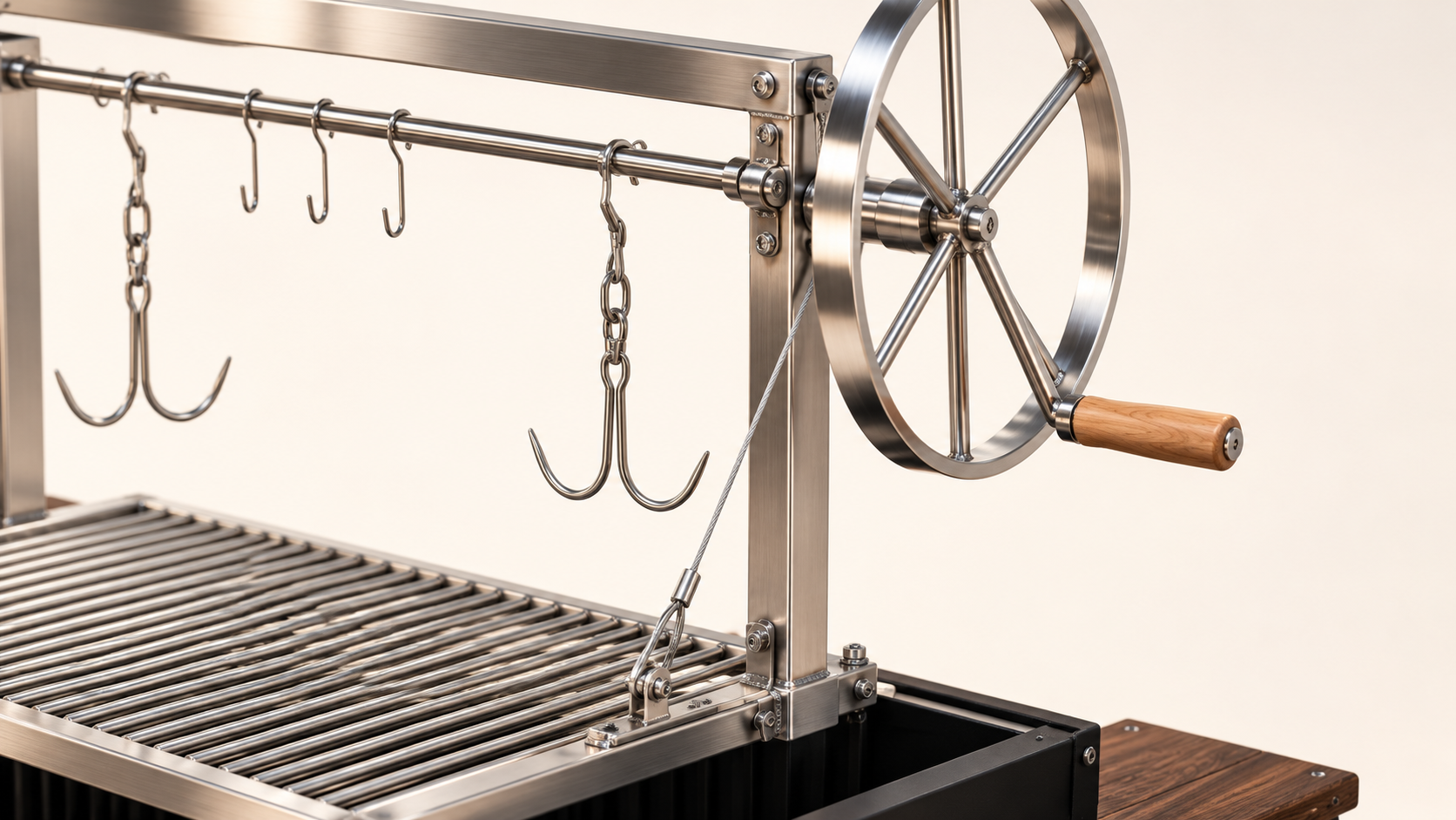 Hand-crank wheel and cable mechanism for the height-adjustable grate